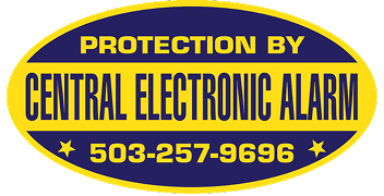 Oval sign with "Protection by Central Electronic Alarm" and phone number "503-257-9696" in yellow text on a blue background.